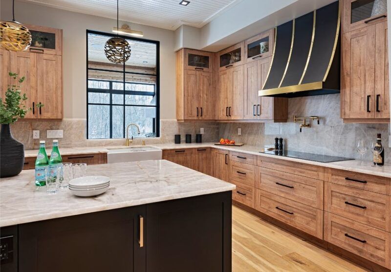 Kitchen Cabinet Trends 2025: Embrace Bold Colors and Timeless Elegance Mixing textures and finishes
